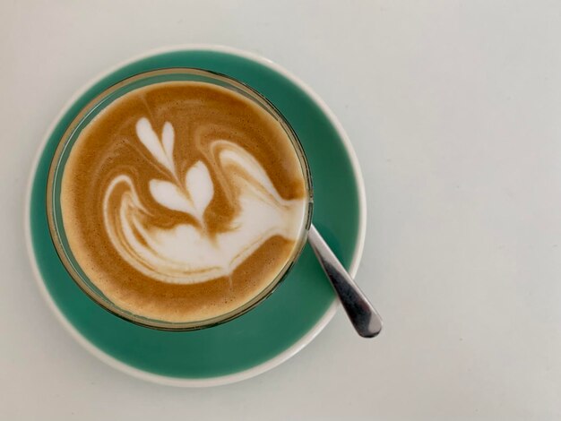 Latte art in coffee mug