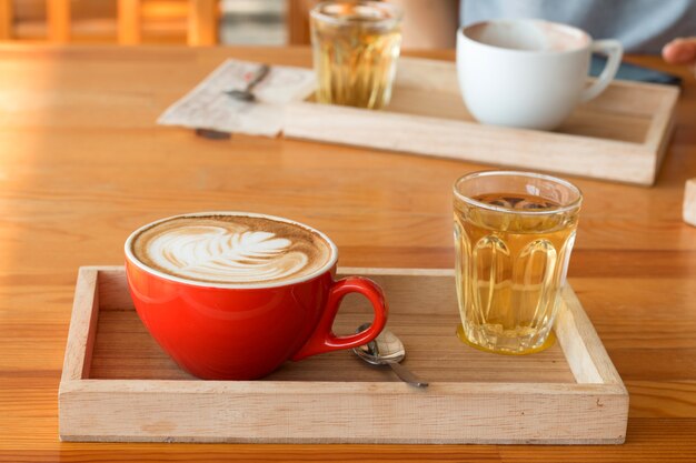 Latte art in a cup topping beautiful art from milk