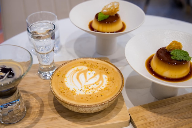 Latte and egg pudding in coffee shop