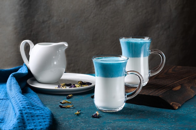 Latte Matcha Dalgona. Hot fresh milk with blue butterfly pea flowers