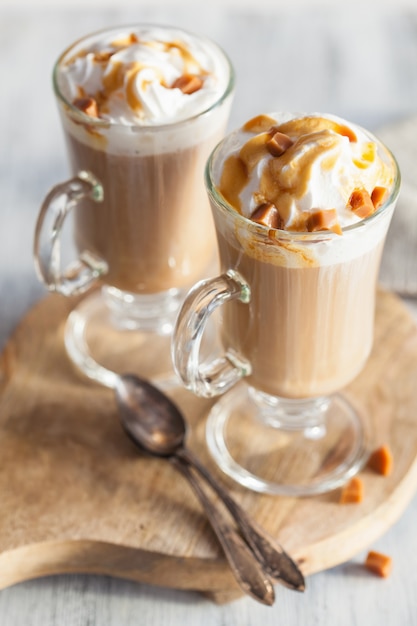 Latte with whiped cream and caramel