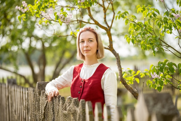 Latvian woman in traditional clothing. Ligo folk.