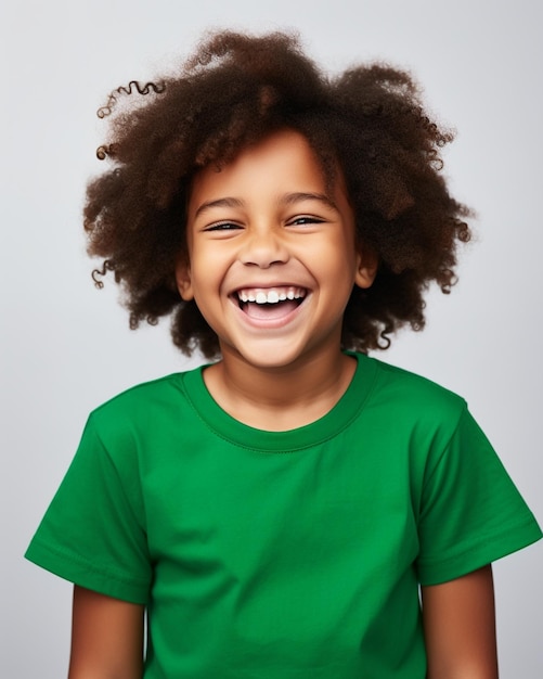 Laughing african child wearing green shirt