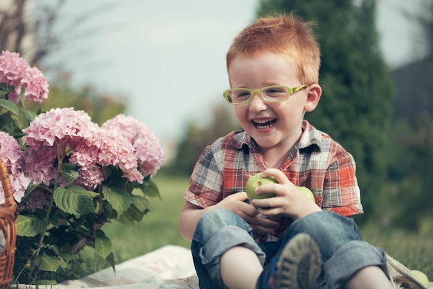 Laughing boy on picnic