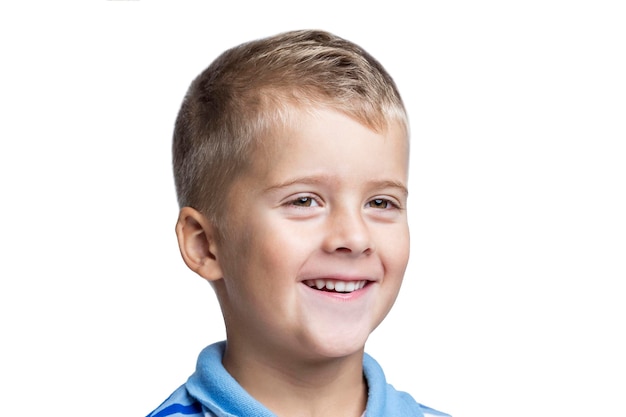 Laughing boy of school age Positivity and emotions Isolated on white background Closeup