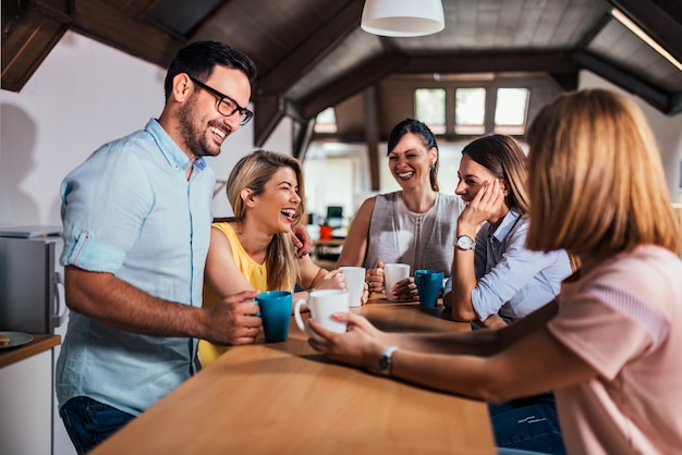 Laughing at coffee break.