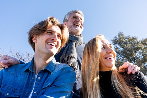 Laughing family enjoying time outside