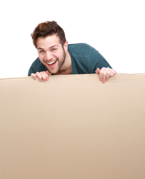 laughing man holding blank poster