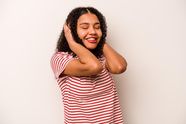 Laughs joyfully keeping hands on head Happiness concept