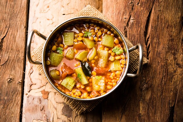 Lauki or Doodhi Chana Dal Subji or Bottlegourd Gram Curry, served in a bowl.selective focus