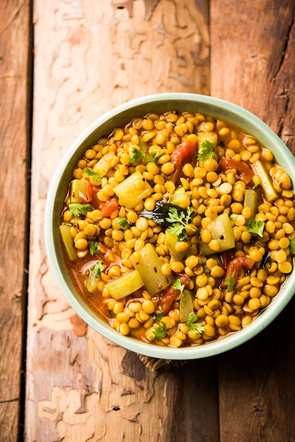 Lauki or Doodhi Chana Dal Subji or Bottlegourd Gram Curry, served in a bowl.selective focus