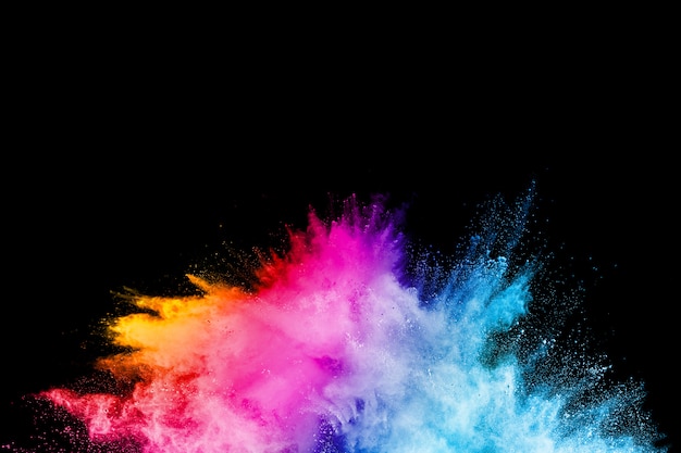 Photo launched colorful powder on black background.