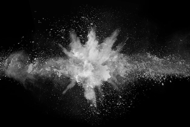 Launched colorful powder, isolated on black background.