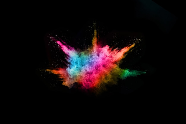 Launched colorful powder, isolated on black background.