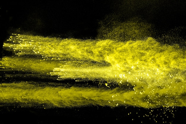  Launched yellow dust  particles splashing.