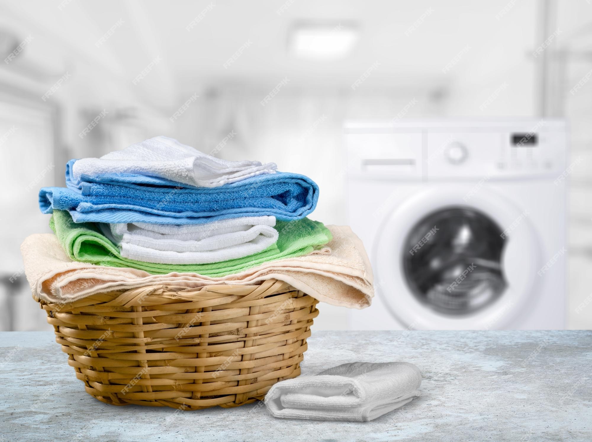 Premium Photo | Laundry basket on blurred background of modern washing ...