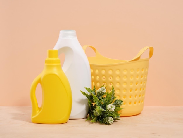 Laundry basket and colorful bottles of detergents Laundry day on weekend