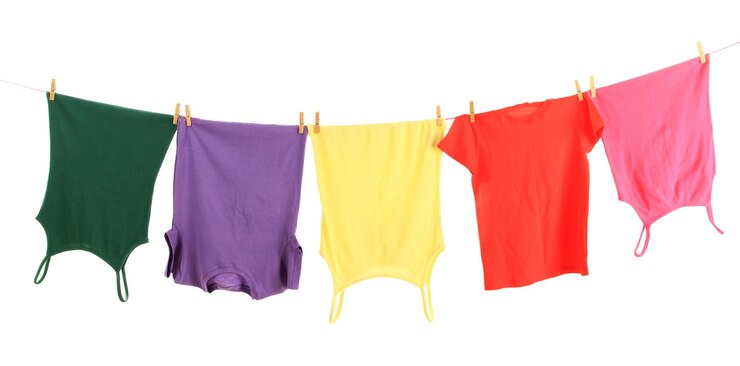 Photo laundry line with clothes isolated on white