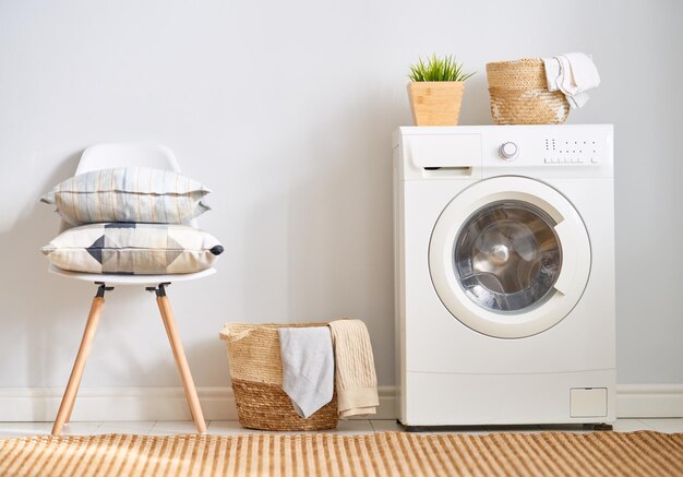 Laundry room with a washing machine