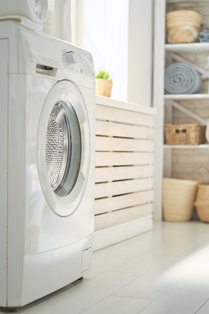 Photo laundry room with a washing machine