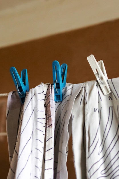 Photo laundry washed on a rope is dried