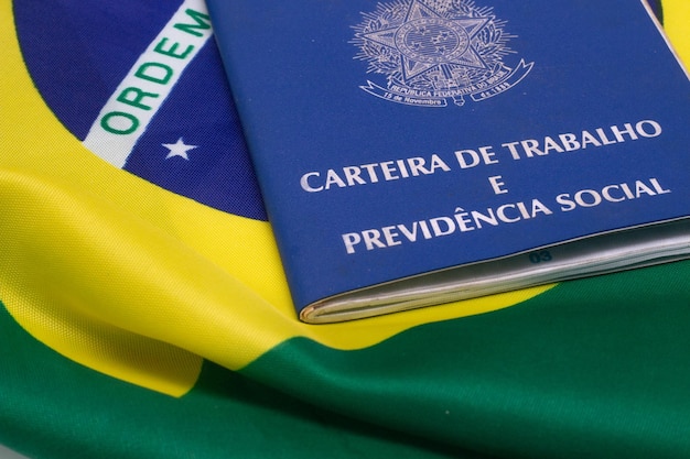 LAURO DE FREITAS BRASIL JULY 21 2022 brazilian work document with a brazilian flag and calculator