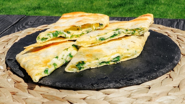 Lavash on the grill with juicy cheese