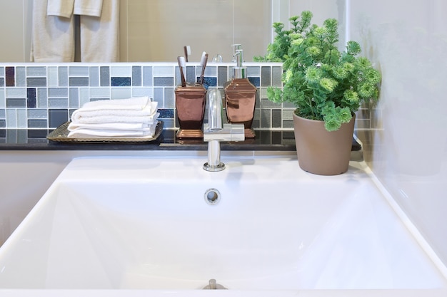 Lavatory and accessories with mosaic wall 