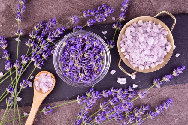 Lavender bath salt with fresh lavender flowers Flat lay