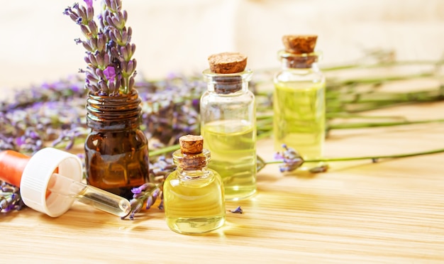 Lavender essential oil in a small bottle. Selective focus. nature.