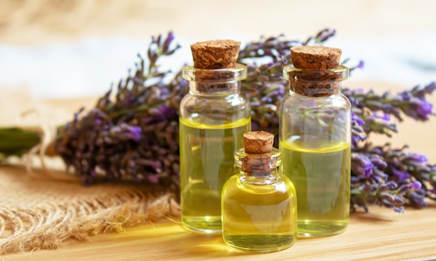 Lavender essential oil in a small bottle. Selective focus. nature.