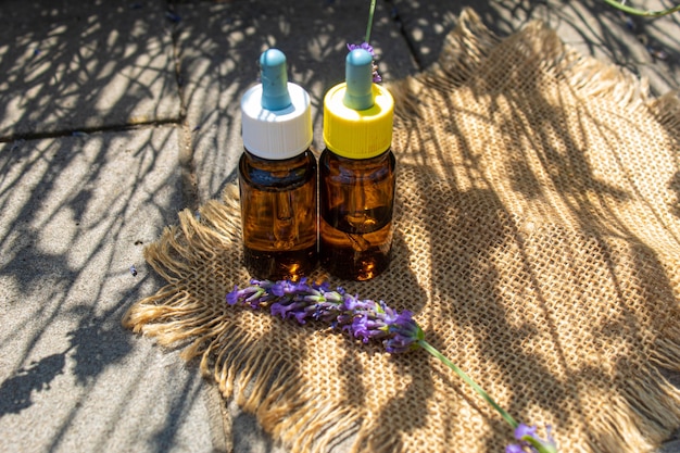 Lavender essential oil in a small bottle. Selective focus.