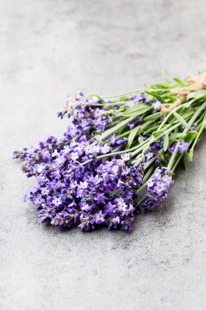 Lavender flowers, bouquet on rustic background, overhead.