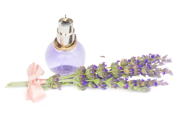 Lavender herbal water in a glass bottle with fresh flowers