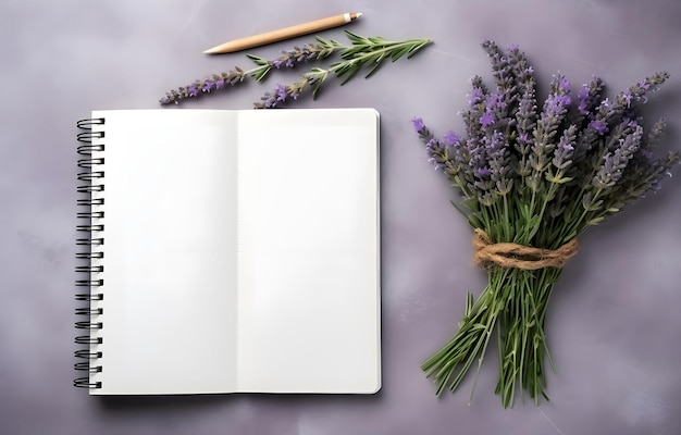 lavender herbs and empty notebook on grey snowy background top view