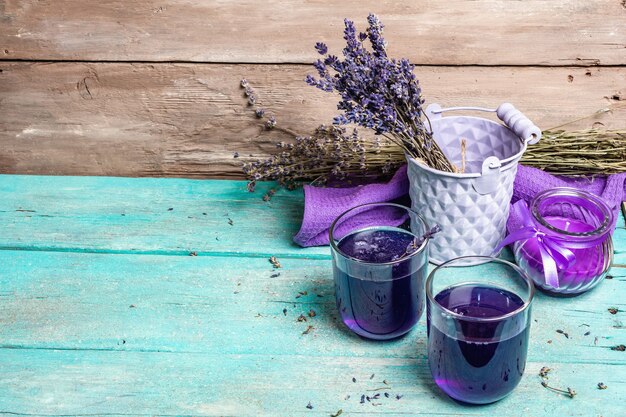 Lavender hot tea on vintage wooden table