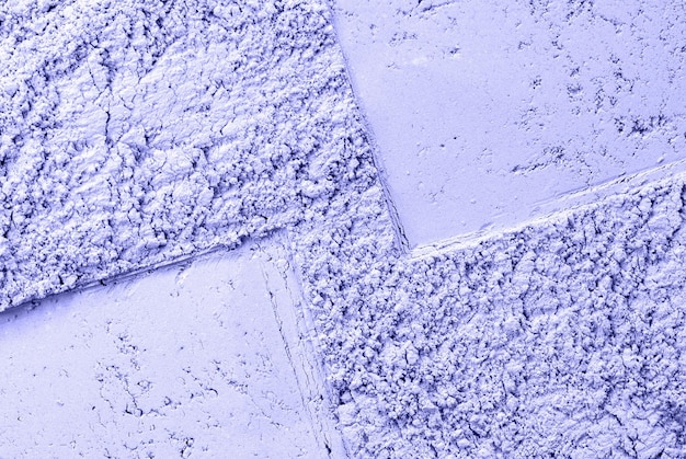 ラベンダー-紫色の粉末の質感、化粧品の背景としてのゆるいアイシャドウ