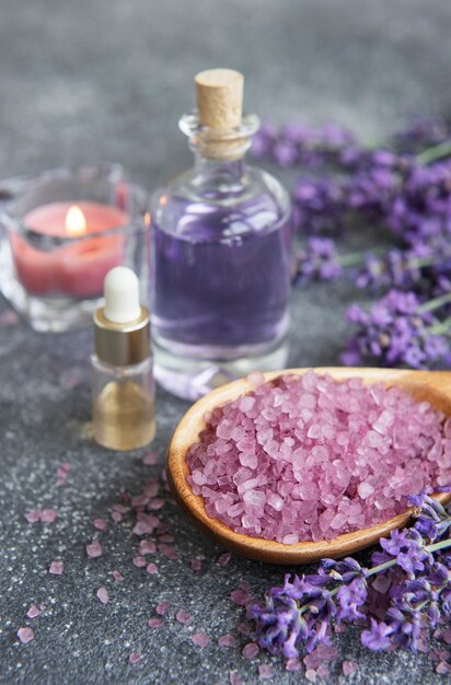 Lavender spa. Essential oils, sea salt and candle. Natural herb cosmetic with lavender flowers