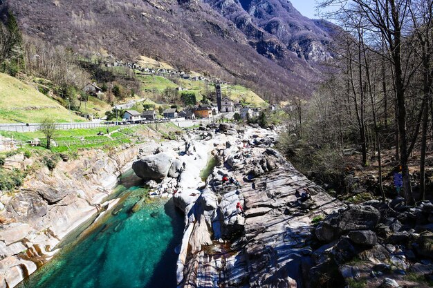 Lavertezzo switzerland 10 april 2022 view to the village rocks and clear verzasca river in ticino switzerland