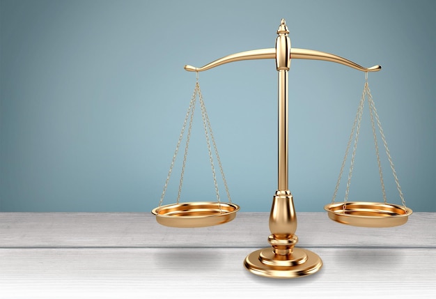 Law scales on table background. Symbol of justice