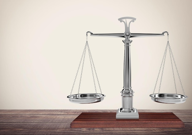 Law scales on table background. Symbol of justice