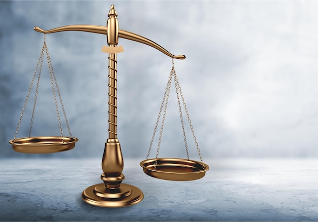 Law scales on table background. Symbol of justice