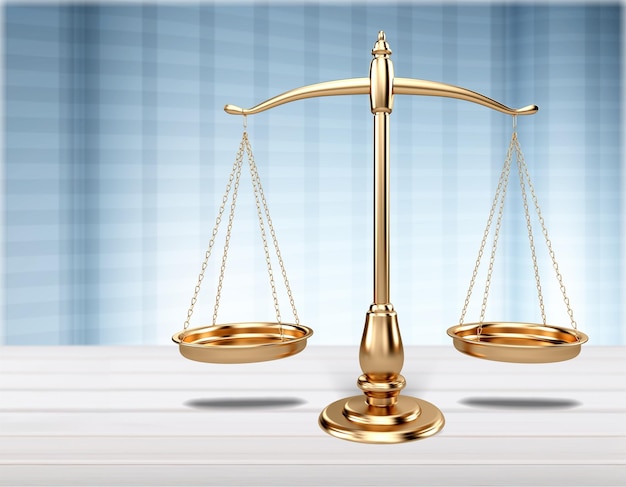 Law scales on table on light background