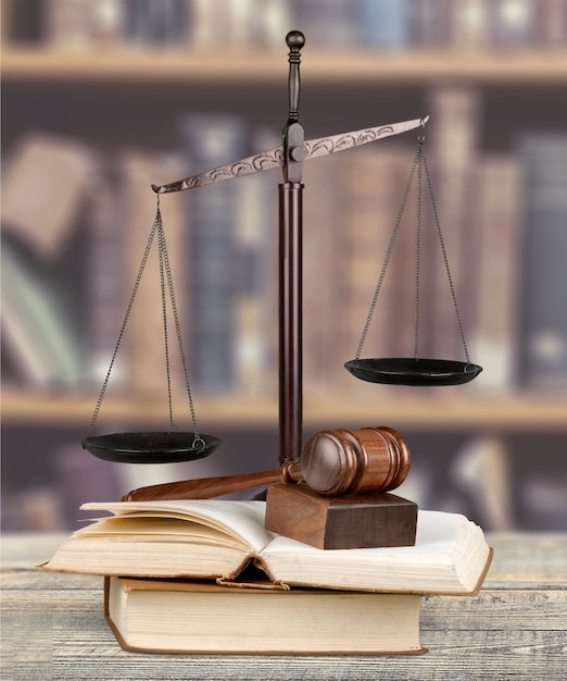 Law scales on table, symbol of justice