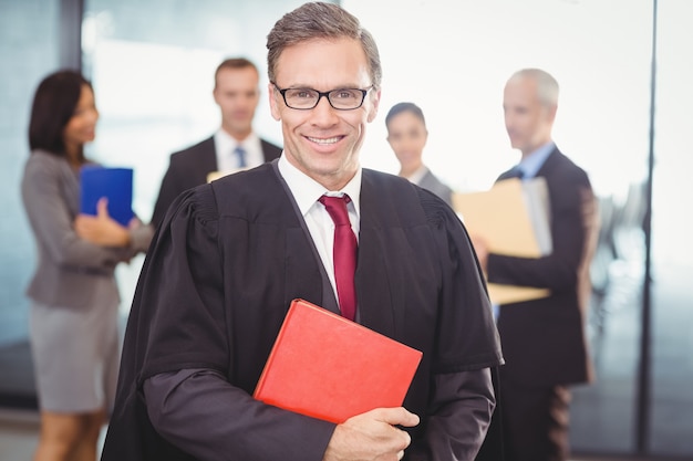 Lawyer holding a law book