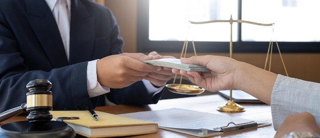 Lawyer or judge is taking a bribe In the client's courtroom at the lawyer's office In order to bribe to gain an advantage in the form of lawsuits the concept of bribery and corruption in law