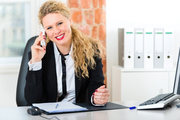 Lawyer in office sitting on the computer