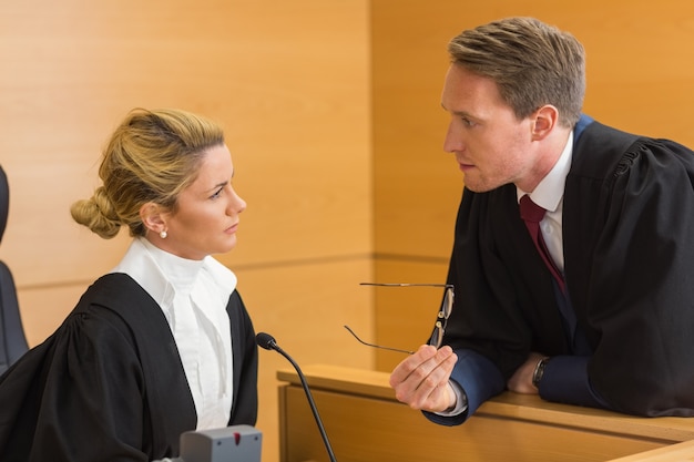 Lawyer speaking with the judge