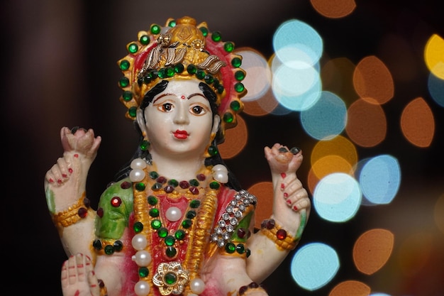 Premium Photo | Laxmi devi cute statue in diwali night Premium Photo | Laxmi devi cute statue in diwali night