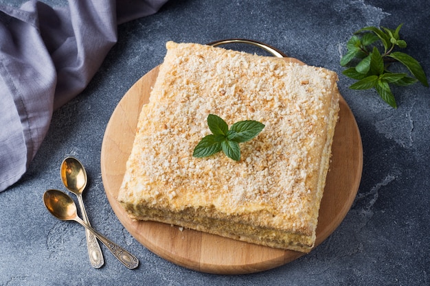 Layered cake with cream Napoleon millefeuille vanilla slice with mint 